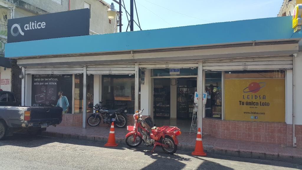 Retail storefront with Altice and Leidsa signage — PKCELL distribution partner